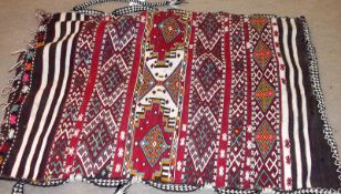 A Turkish Kilim Floor Cushion, typically decorated with striped geometric designs, 1.2m x .87m