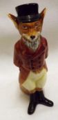 A Royal Doulton Model of a Fox in hunting suit and top hat, decorated in colours, No D6448, 5” high