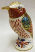 A Royal Crown Derby Imari coloured Paperweight of a hummingbird, with gold stopper, 4” high