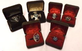 A group of four boxed Caithness white metal and millefiori Glass Panelled Rings and two similar