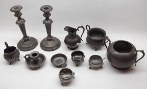 A Mixed Lot of various Pewter Wares including: A pair of Candlesticks, two Cream Jugs, two x two