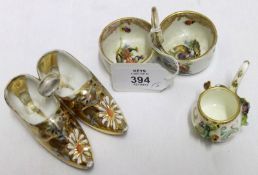 A small Crown Staffordshire floral decorated covered Pill Box; together with a Novelty German gilt