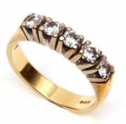 A hallmarked 18ct Gold five brilliant cut Diamond Line Ring, approx .6ct total