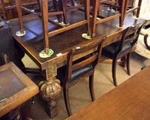 An early 20th Century Heavy Oak Draw Leaf Extending Dining Table with a rectangular top,