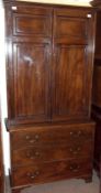 A Composite 18th Century and later Mahogany Side Cabinet, the top section with two panelled doors to