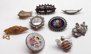 A Mixed Lot comprising: a Victorian 9ct Gold Oval Brooch; three Micro-Mosaic Brooches; a Garnet