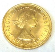 An Elizabeth II Gold Sovereign dated 1968.