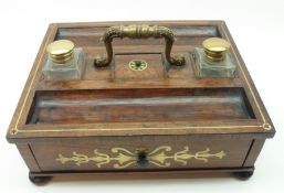 A 19th Century Rosewood and Brass inlaid Ink Stand, fitted with two Ink Bottles, two Pen Rests and a