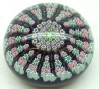 A 20th Century Paperweight decorated with central rosette of pink, purple, green and red coloured