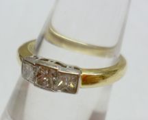 A hallmarked 18ct Gold Princess cut Diamond Ring, line set, approximately.4ct total.