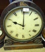 A 19th Century large stained Oak cased Bracket Clock, circular face with black Roman chapter ring,