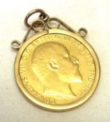 An Edward VII Gold Half Sovereign within a plain hallmarked 9ct Gold Pendant Mount.