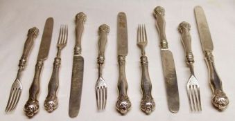 Nine pairs of early Victorian Silver Fruit Knives and Forks, with grapevine engraved blade, grape