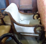 An early 19th Century Mahogany Library Chair, swept back and reeded uprights terminating in