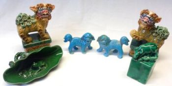 A Mixed Lot of Oriental Wares: Two blue glazed Temple Dogs, a further Celadon leaf formed Pocket