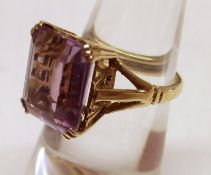 A hallmarked 9ct Gold emerald cut Amethyst Dress Ring, basket set.