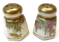 A pair of Satsuma Salts of spreading hexagonal form, painted in typical colours with stylised