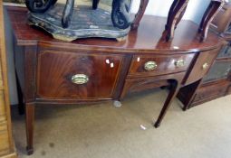 An early 19th Century Mahogany Bow Fronted Sideboard, satinwood strung and cross banded top over a