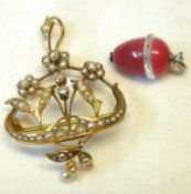 An unmarked yellow metal Art Nouveau open work Pendant of floral basket design, 28mm x 32mm, set