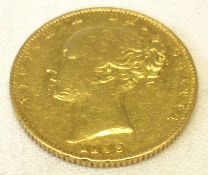 A Victorian Gold young head Sovereign dated 1843.