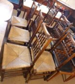 A set of six 19th Century Oak Spindle back Dining Chairs, (2 Carvers), with Rush seats and