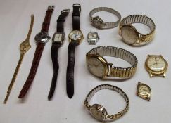 A packet containing three assorted Gents Wristwatches including a 9ct Gold Presentation example by