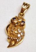 A hallmarked “9ct” Gold Owl Pendant, gemstone set, 22mm drop, weighing approximately 2 ½g all in.