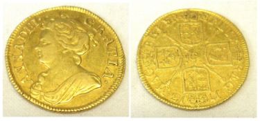 A Queen Anne Gold Guinea dated 1713.