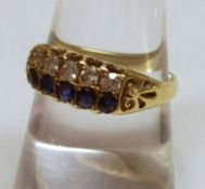 A high grade precious metal Ring, line set with five small old cut Diamonds and five small mid