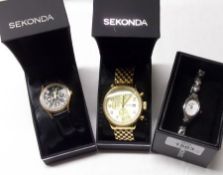 A Ladies Boxed Stainless Steel Cased Wristwatch together with two Gents Sekonda Gold plated