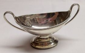A single Victorian boat shaped Salt in George III style, reeded rim, swept handles, oval base, 4”