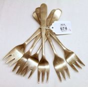 A heavy set of six Elizabeth II modernist style three prong forks, 6” long, Birmingham 1970,