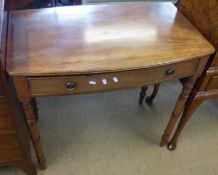 A 19th Century Mahogany single drawer Side Table with Brass ringlet handles, raised on turned