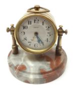 An early 20th Century French Alarm Clock “DEP”, Silvered circular face with black Arabic chapter