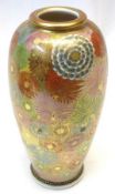 A Satsuma baluster Vase, well painted in colours with an all over floral design, in iron red,