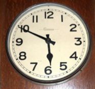 A mid 20th Century Oak cased Electric Master/Slave Clock, Gensign, (General Signal & Time Systems