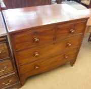 A Victorian Mahogany four drawer Chest of two short and two full length drawers, with turned knob