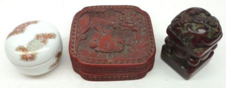 A 20th Century Cinnabar lacquer Box of shaped square form, the centre embossed with figures and