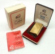 A Boxed Calibri Molectric Lighter with instructions and outer box