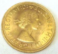 An Elizabeth II Gold Sovereign dated 1965.