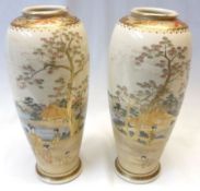 A pair of 20th Century Satsuma Baluster Vases of tapering form, painted in typical colours with