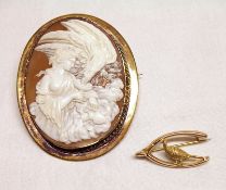 A large Victorian gilt metal framed Shell Cameo Brooch of Gamymead and the Eagle, 66mm x 54mm,