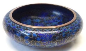 A modern Cloisonné Bowl of compressed circular form, decorated with an all over floral design in
