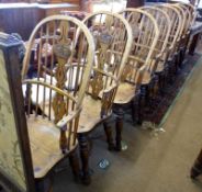 A set of eight good quality Oak Reproduction Windsor style Stick Back Armchairs, by Le Fevre of