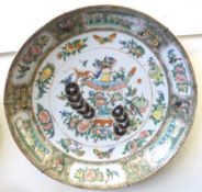 A Canton famille rose circular Dish, the interior painted in colours with panels of hatching chicks,