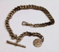 A heavy hallmarked Silver graduated curb link Watch Chain with “T” bar and snap, 12” long,