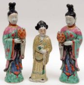 A pair of 19th Century Chinese Figure formed Candle Holders, formed as Standing Maidens in