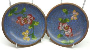 A pair of Chinese Cloisonné small circular Pin Dishes, each inset with sprigs of foliage on a pale