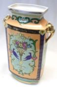 A Noritake two-handled Baluster Vase of rectangular form, decorated with panels of exotic birds