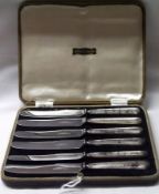 A cased set of six Stainless Bladed and Silver-handled Cake Knives (A/F)